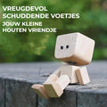 Charmant klein houten schommelfiguurtje met 12 magnetische uitdrukkingen